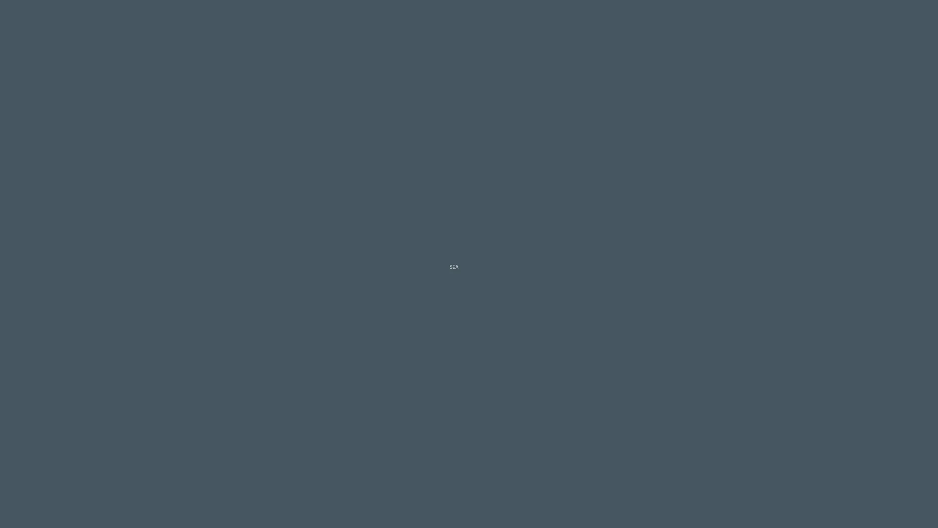 A calm sea under soft, natural light